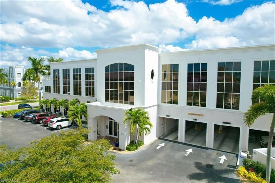 This sophisticated and character-rich executive office suite is a rare opportunity to acquire. Prestige address on US 41 near Downtown Naples.  It features over 3000 square feet of thoughtfully designed layout including 10 large private offices, with two extra-large offices that can easily function as conference rooms or boardrooms, offering flexibility for meetings, presentations, and collaborative use. At the center of the suite is a flex collaboration lounge, ideal for team interaction, and overflow workspace. Additional amenities include a spacious and classy lobby, a kitchenette, and coffee bar, floor to ceiling windows, elegant crown molding and refined wood millwork, making it ideal for a distinguished and sophisticated workplace that reflects professionalism and success. 
This distinguished building has the perfect privacy/and exclusivity with a blend of well established tenants with little signage and a beautiful building lobby. A great fit for a family office, wealth management, boutique law/ CPA firms, Insurance companies, Business consultants. This space is also well-suited for an occupant who can utilize multiple private offices or Medical, health or Wellness without needing heavy daily traffic. There are 2 Deeded exclusive covered parking spaces and shared public parking for the building.