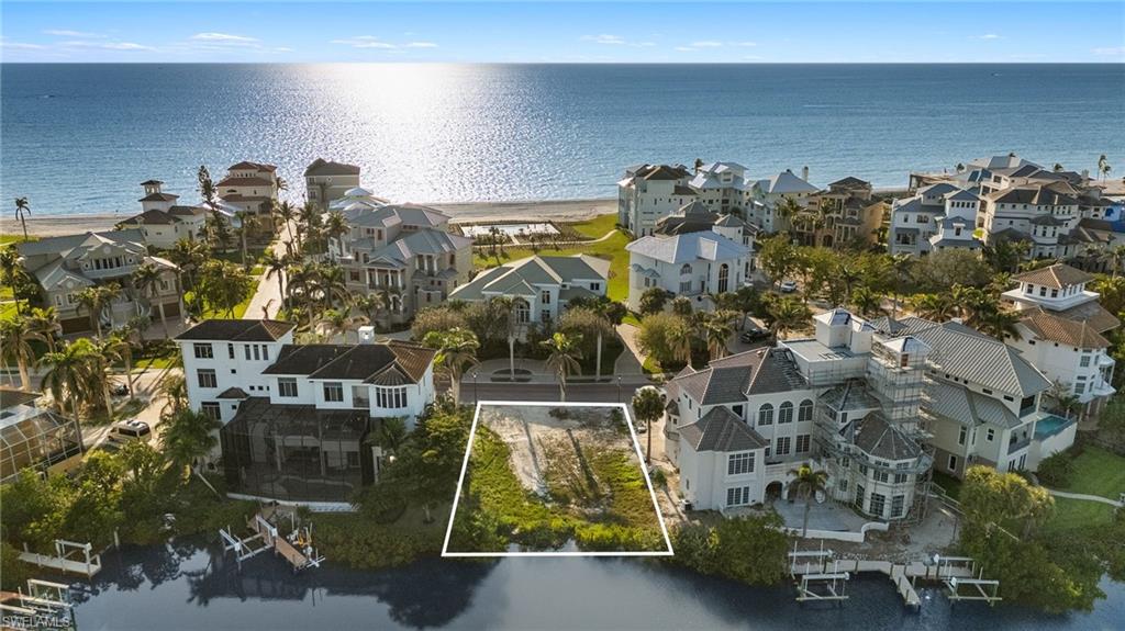 BAREFOOT BEACH - Land