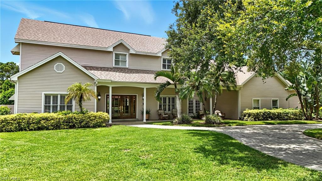 Photo of 13033 Coco Plum LN, NAPLES, FL 34119 (MLS # 225064950)