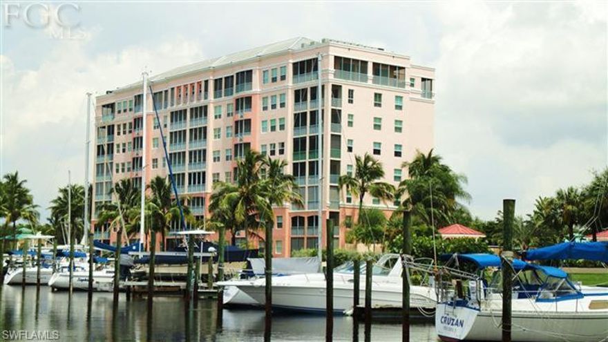 Highly desirable, sought after, western sky sunsets & expansive marina views are yours to enjoy from this welcoming corner residence. The Useppa floor plan is highly sought after END UNIT floor plan with its 3rd bedroom (or den), tasteful color scheme, western lanai exposure with terrific marina views & reasonable condo dues, what's not to love? Inviting open floor plan boasts 9' ceilings & a view from almost every room. Enjoy views of the marina basin & harbor beyond from the attractively appointed kitchen featuring raised panel cabinetry, solid surface counters & updated appliances. The Master suite also boasts great harbor views, his & her walk-in closets & inviting in-suite bathroom with dual sinks, separate shower & bathtub. Large screened lanai is a perfect place to entertain friends. Burnt Store Marina boasts SW FL's largest full svc deep water marina w/ direct access to the gulf, 27-hole exec course w/ clubhouse, fitness ctr w/ tennis & onsite dining.