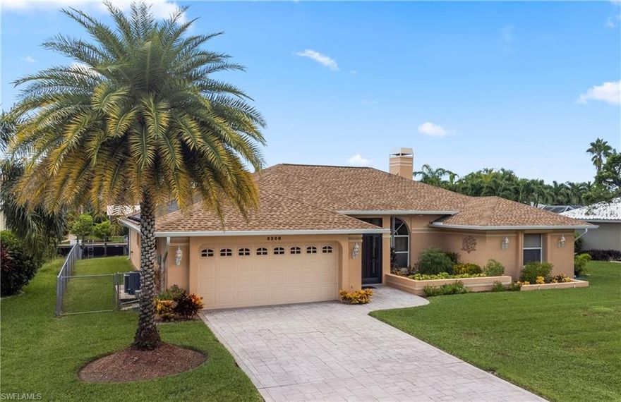 Major PRICE IMPROVEMENT!  Sellers want it SOLD!
MUST SEE direct sailboat access custom built home in Southwest Cape Coral.  UNIT 64!  This home has so many upgrades!  Beautifully landscaped, 3 bedrooms plus a large den and separate laundry/craft room.  Large master bathroom with separate walk in shower and a large soaker tub.  Another large guest bath and a stand alone pool bath.  Custom hardwood cabinets in the kitchen and granite counter top.  Vaulted ceilings throughout.  Hardwood floor in the family room along with a propane fireplace!  Large solar and electric heated pool with a stamped concrete pool deck.  Outdoor grill with a hood system and sink.  10,000# boat lift with a canopy and composite captain's dock.  Storm shutters for every window and electric storm shutters on the lanai.  3 year old dual zone A/C and a new roof in November of 2019!  50 gallon newer water heater.  Fenced in backyard. This home really has it all!  Don't wait!