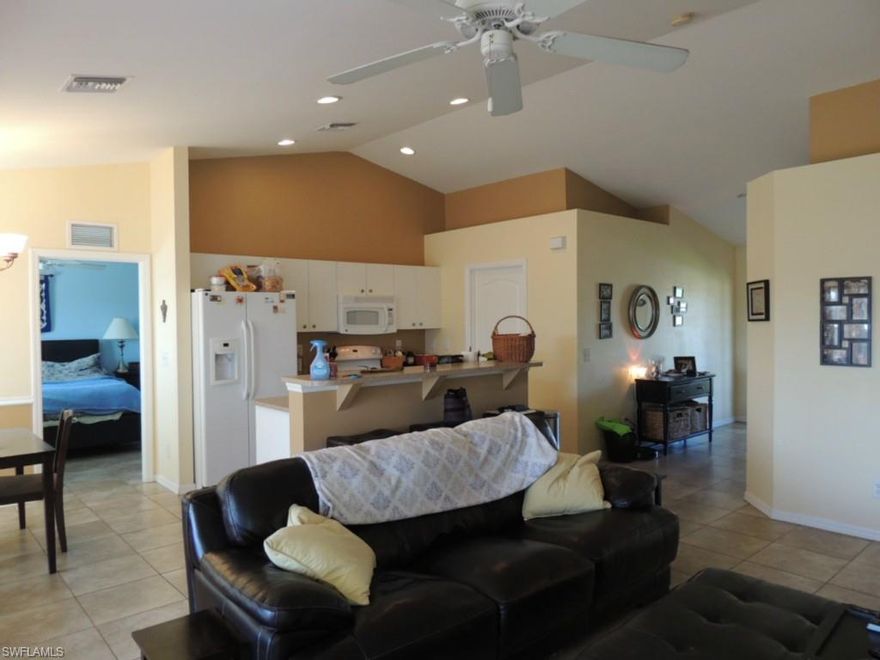 This lovely 3 bedroom 2 bath home has been recently tiled throughout. The seller has made the den into a formal dining room with glass French doors. Enjoy the peace and quiet on the screened lanai and the privacy with the wood fence, in addition to the home is situated at the end of the street. Great location easy access to Sunshine Blvd.