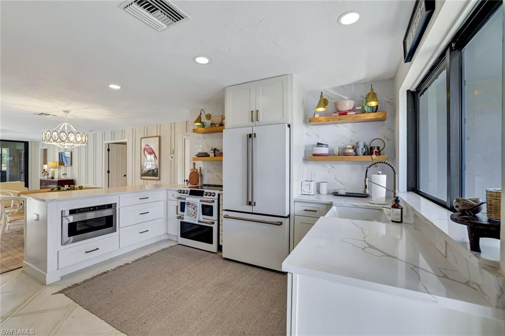 Photo of 3107 Riviera DR #A-202, NAPLES, FL 34103 (MLS # 224097219)