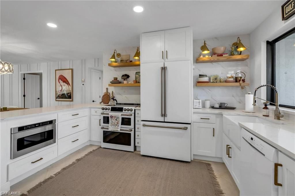 Photo of 3107 Riviera DR #A-202, NAPLES, FL 34103 (MLS # 224097219)