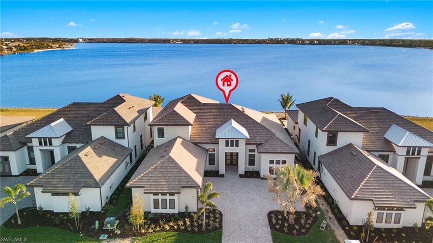 Look no further! Gorgeous Beacon Pool home on the Big Water of Lake Como. Huge Southern Water views 
add to the unique appeal.  Beautiful Great Room Wall with Modern detail features a linear fireplace with Modern Millwork! Rich Beams in the Ceiling add to this masterpiece! Exquisite Millwork is showcased in the Master Bedroom and Dining Room Ceiling. 11341 Venetian Lagoon Drive in Fort Myers, FL 33913 is a stunning property located in a serene and picturesque neighborhood. This beautifully designed home features modern architectural elements and an inviting layout, perfect for both relaxation and entertaining. 

As you step inside, you are greeted by spacious living areas filled with natural light, showcasing elegant finishes and high ceilings. The gourmet kitchen boasts state-of-the-art appliances, ample counter space, and a breakfast bar, making it ideal for culinary enthusiasts. 

The master suite serves as a private retreat, complete with a luxurious en-suite bathroom featuring dual vanities,  and a huge shower. Additional bedrooms provide comfortable accommodations for family or guests, while an office or den offers a quiet space for remote work.

Outside, the property features a beautifully landscaped yard, perfect for outdoor gatherings or enjoying the Florida sunshine. The lanai also includes a pool, spa and outdoor kitchen providing an oasis for entertainment and relaxation. 

Located conveniently near shopping, dining, and recreational facilities, this home offers a perfect blend of luxury and lifestyle in the heart of Fort Myers. Esplanade Lake Club is a brand new community with top notch amenities. This development shares Lake Como with Miramar Lake and Country Club! Incredible location just 5 minutes from the Ft. Myers airport yet not in the flight path! Across the street from Gulf Coast Town Center where there is endless Shopping and Dining! Truly one not to be missed!