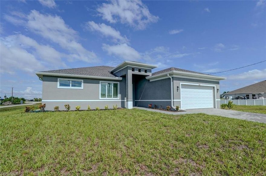 BEAUTIFUL NEW CONSTRUCTION NW Cape Coral house 4 Bedroom + DEN 2 baths and 2/CAR GARAGE IN NW CAPE CORAL WITHOUT THE WAIT! Certificate of Occupancy in hand. Situated in a Fast Growing, desirable NW neighborhood, surrounded by canals, within walking distance to Public Golf Course. Come see this beautiful 4-bedroom w/Den, 2-bathroom 2 Car garage house before it's too late! Upon entering, you'll immediately notice the attention to detail. The heart of the home is the great room, which is flooded with natural light with glass sliders that lead to the extended under-truss lanai area and custom pool ready to soak in the Florida sun. The charming kitchen has ample cabinet space, stainless steel appliances, pantry, Granite counter tops and a breakfast bar. Den that can be used a formal Dining space or a great home office or 5th bedroom. The primary suite includes transom window, tray ceiling feature and a barn door; the primary bath is spacious with double sinks Granite countertops and spacious shower with frameless enclosure, double walk-in closets. Wood Plank Tile throughout the entire including the bedrooms. The three additional bedrooms share a guest bathroom with a tub/shower combo. 2 car garage to store all the toys. The exterior of the home includes a paver driveway & walkways along with sprinkler system upgraded landscaping. Other features that come with the home include All windows and doors are hurricane glass, paver driveway and lanai, a programmable thermostat, a Wi-Fi-enabled garage door opener. BUILDERS WARRANTY INCLUDED! Close to Schools, Shopping, amenities and many Parks, and recreational areas.