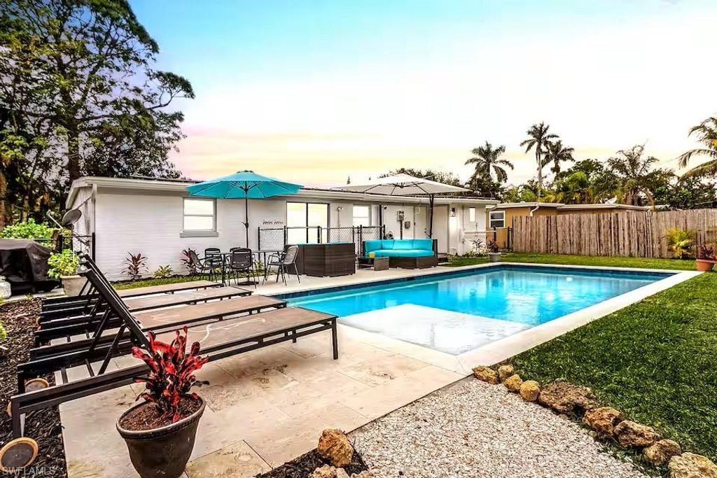 Photo of 1303 Delmar LN, NAPLES, FL 34104 (MLS # 226013447)