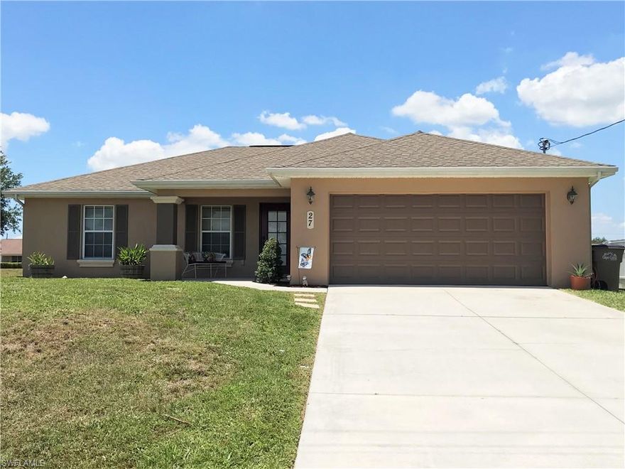 A must see!! Newly updated 3/2/2 plus den, freshly painted inside and out. New kitchen with 42" cherry wood cabinets, quartz counter tops with black stainless steel appliances and large stainless steel island sink, plus an added feature, in the electric outlet it has usb power for charging your phones etc. on each side of kitchen island. Guest bath has been updated with cherry wood cabinets and granite counter tops. Master bedroom has his and hers walk-in closets.  All new 5mm luxury wood look vinyl plank flooring throughout the entire house, it also has an irrigation system and screened Lanai. Vaulted ceilings and decorative plant shelves.