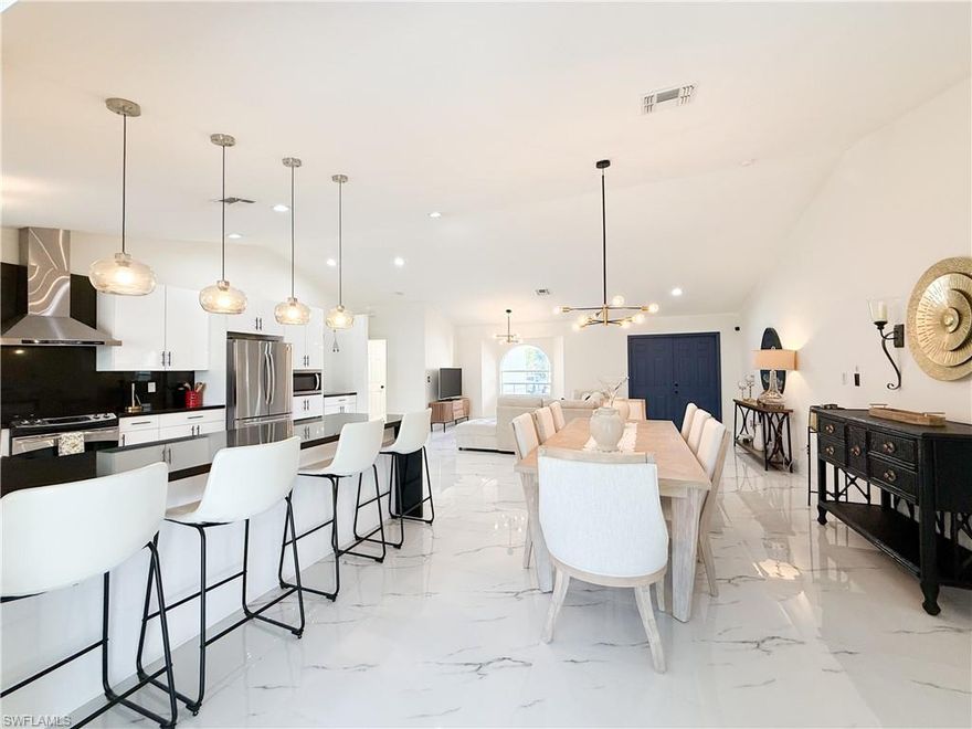 Remodeled home in Golden Gate Estates situated on over an acre with no HOA, offering the space and privacy you’ve been looking for. This 3-bedroom, 2-bathroom residence features over 1,700 square feet of beautifully finished living space.

Step inside through the double front doors into a bright, open floor plan that seamlessly connects the living and dining areas, perfect for both everyday living and entertaining. The home features a beautifully remodeled kitchen with white shaker cabinets, dark granite countertops, and a spacious peninsula with breakfast bar seating. Additional highlights include stainless steel appliances, a range hood, and pendant lighting. Sliding glass doors lead out to the backyard, enhancing indoor-outdoor living.

The primary suite offers a relaxing retreat with a soaking tub, separate shower, dual sinks, and a walk-in closet. Two additional bedrooms provide flexibility for family, guests, or a home office.

Out back, enjoy a screened-in patio and fully fenced yard, creating a private outdoor space to relax year round. New roof completed in 2024.