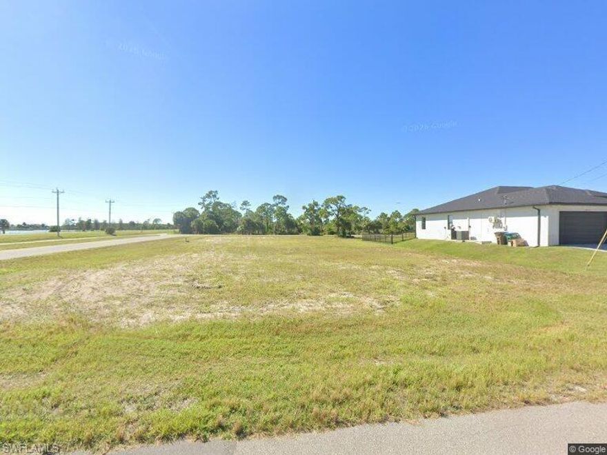 Positioned in the fast-growing northwest section of Cape Coral, just minutes from the highly anticipated Seven Islands Project, this exceptional oversized lot offers a rare opportunity to build in one of Southwest Florida’s most sought-after areas. Located directly across from scenic Quicksilver Lake—surrounded by Gulf access properties—this homesite captures the essence of Florida living with tranquil water views and a premium setting. The neighborhood is rapidly transforming, with new construction driving demand and value. Ideally situated between Cape Coral and Punta Gorda, this location provides convenient access to shopping, dining, and coastal attractions while maintaining a peaceful residential feel. Large lots like this are becoming increasingly scarce, making this property even more desirable. With no HOA or CDD fees, you have the freedom to design and build your dream home without added restrictions or costs. The lot is already cleared, saving you time and expense as you begin your build. Additionally, the future Crystal Lakes Park is permitted and underway within walking distance, adding even more appeal and long-term value to the area. Skip the congestion of Fort Myers and secure your place in this thriving community before it’s gone.