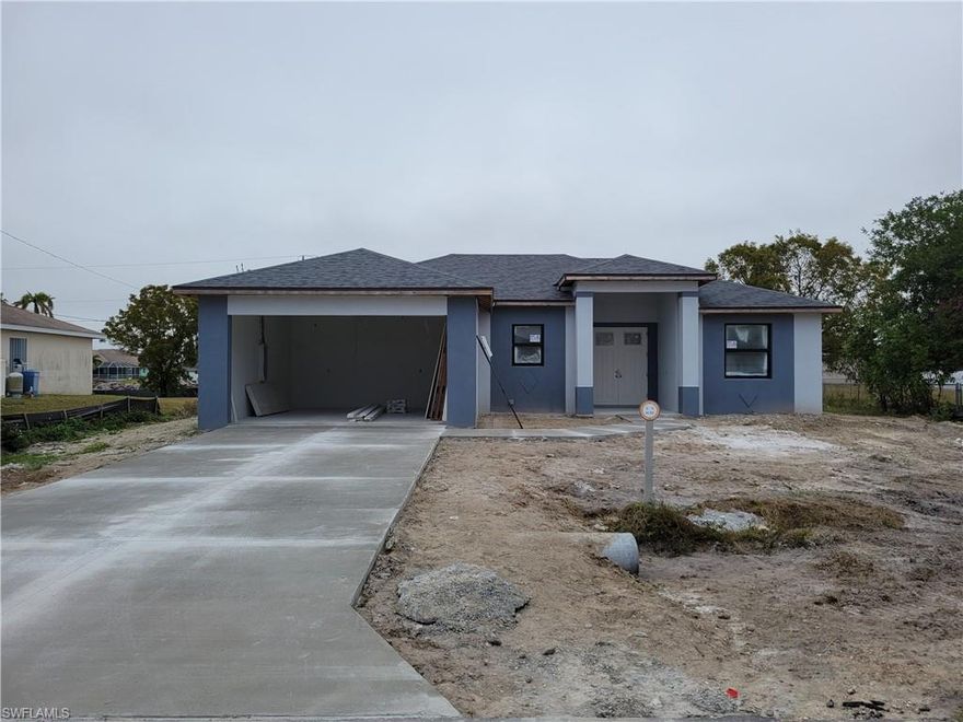 New home with city utilities!!! Open floor plan with 3 bedrooms and 2 bathrooms. Shaker style kitchen cabinets with quartz countertops. Living area has huge tile 31x31, 2 walk in showers, master bath has double sinks, Tray ceilings, impact glass windows and doors. Home is still Under Construction, estimated date of completion end February. Some pictures of finished house