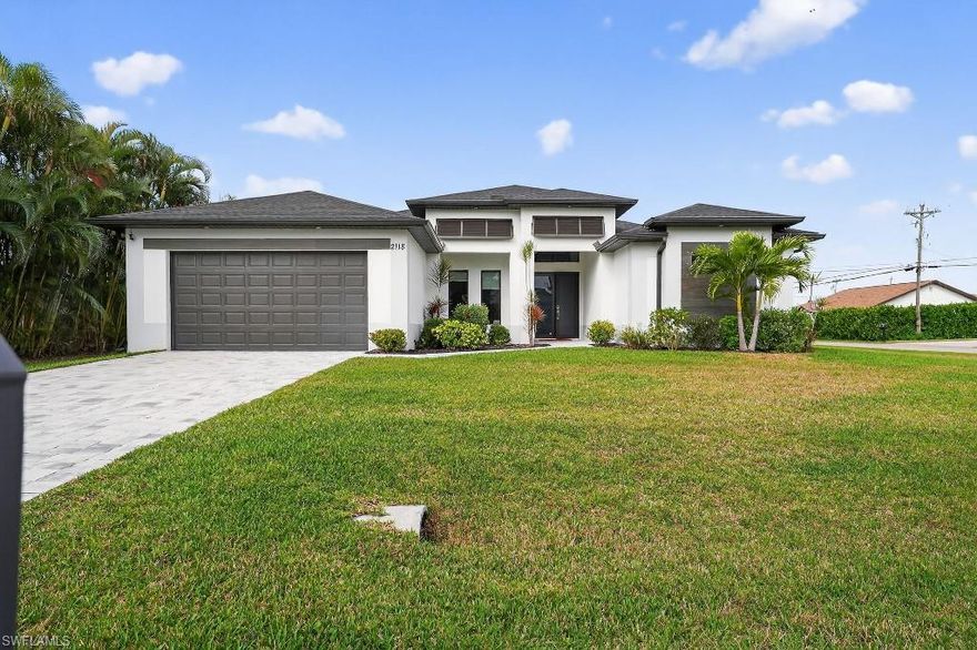 – 2023 Built Home in SW Cape Coral – No HOA – Not in a Flood Zone

Built in 2023, this single-story home offers 2,131 square feet of living space (2,830 total under roof) with a bright, open layout and durable concrete block construction.

The main living area features a custom fireplace and large sliding glass doors that fill the space with natural light and provide seamless access to the outdoor area. The kitchen is finished with quartz countertops, stainless-steel appliances, and a modern waterfall island.

The split-bedroom floor plan provides privacy, with a spacious primary suite offering direct lanai access and a well-appointed ensuite bath. Two additional bedrooms and a full bathroom provide flexibility for family, guests, or a home office.

Constructed with block, concrete, and stucco exterior with a shingle roof, this home offers modern style and long-term durability.

No HOA. Not located in a flood zone.

Conveniently situated in desirable SW Cape Coral, close to shopping, dining, and everyday essentials.