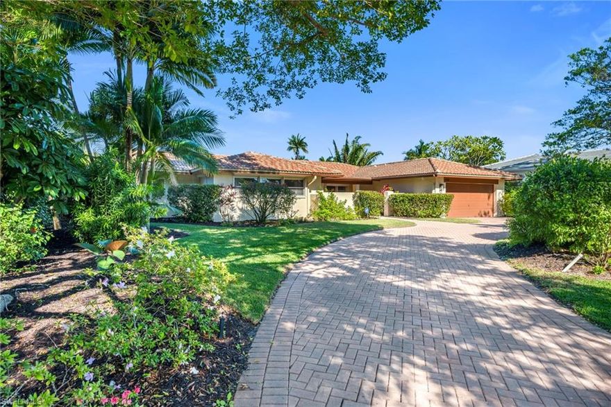 Located in the highly coveted Moorings neighborhood, this lovingly maintained residence by its original owners offers an exceptional Naples lifestyle in a premier school zone. Thoughtfully designed on a single level, the home features 4 bedrooms and 3 bathrooms, with a privately situated primary suite placed on one side of the house to provide comfort and seclusion.
Guests are welcomed into an elegant formal living room and dining area that sets the tone for refined entertaining, with a graceful sightline that draws the eye toward the outdoor living space.
The flow continues to an expansive, oversized lanai with a sparkling pool, creating an ideal setting for year-round indoor-outdoor living, sunset cocktails, and casual gatherings.
A large family room provides a flexible space that comfortably accommodates gatherings of all sizes, whether hosting friends and family or enjoying a quiet evening at home.
The private backyard is a tranquil oasis, highlighted by an orange tree that adds charm, character, and a distinctly Florida touch to the property. Lush greenery and poolside setting combine to create a serene environment perfect for relaxing, entertaining, or simply enjoying the Naples sunshine.
Perfectly positioned near the best of Naples, the home is just a short drive to Riverside and Mercato, where upscale boutiques, cafes, and dining options await. Renowned Gulf beaches, art galleries, and the fine restaurants and luxury shops of the 5th Ave South area are also within easy reach, placing world-class coastal amenities and culture minutes from your front door.