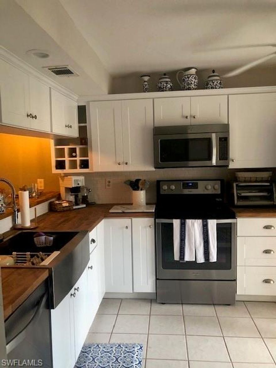 Stunning Beach Chic Resort style completely renovated condo.Gorgeous new kitchen in 2016,with all new S/S appliances with butcher block counters.New Screened lanai,new vanities and plumbing. New doors &hardware,upgraded landscaping in backyard,room for 12x12 patio.2012 Lenox AC,large,new lighting and ceiling fans.New washer &dryer XXL capacity. Tile thruout,large exterior/interior storage. You asked for a gorgeous condo and unbeatable location close to 5th,you got it, just bring your toothbrush and relax &enjoy the Large Resort style swimming pool.Also Winterpark has 6tennis courts,4pickle ball courts,2 bocce courts. Brand new beach chic furniture is negotiable.