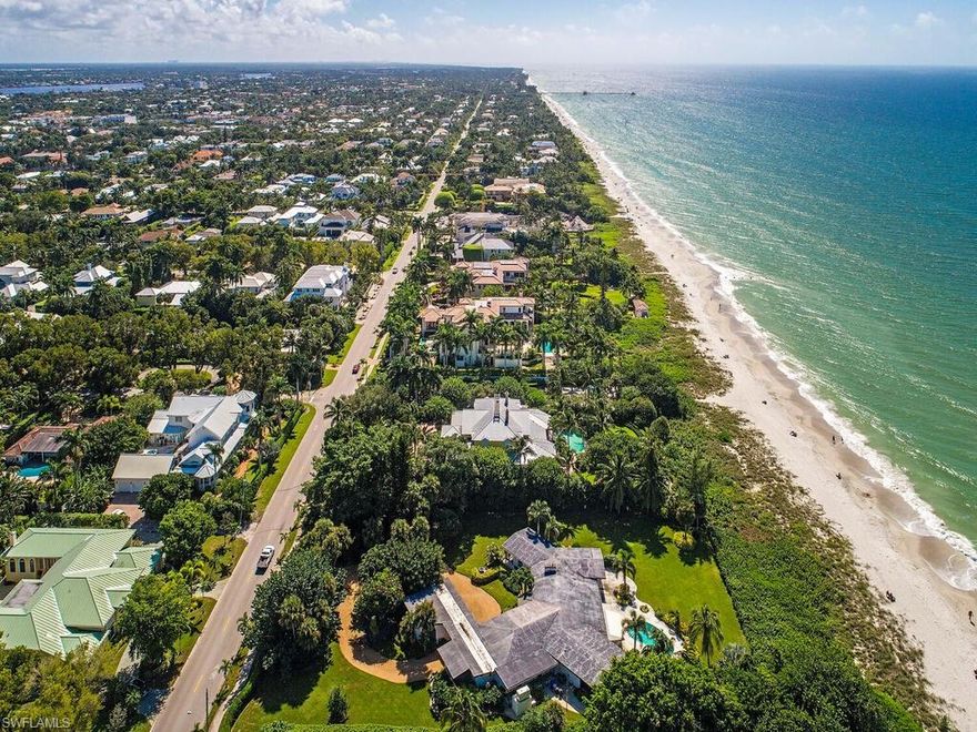 Like no other. This is a once-in-a-lifetime opportunity to build the home of your dreams on one of the most desirable residential building sites on Florida's Gulf Coast.  Behind the seagrass and sea grape windbreak that borders its western edge, this 1.61-acre lot with 189 feet of frontage on the Gulf of Mexico and a depth of approximately 367 feet can be the setting for a custom estate home of any style. Mirror the designs of the world-class estates that line the Naples beaches or take your inspiration from the original cottage built on this lot in 1956 - still home to only its third owner since that time. In whatever way you choose to create your paradise, you will always delight in panoramic views and splendid sunsets. Walk to the anticipated Naples Beach Club which will offer some of the most luxe amenities and services in the world.  Walk to the popular dining and shopping venues on 5th Avenue South and 3rd Street South in Old Naples. The property is offered in "as is" condition.