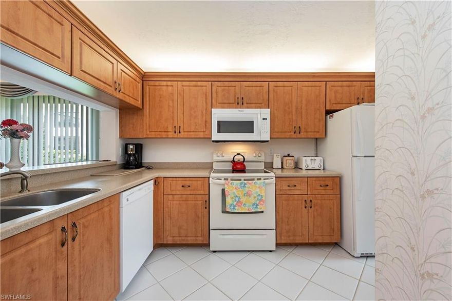 C. 17599 - The Abbey at Berkshire Village offers a central Naples Location.  This light & bright end-unit condo checks all the boxes and has been refreshed featuring electric shutters on every window & the lanai.  Enjoy the tastefully updated kitchen with Corian & newer cabinetry.  There is a HomeTech “Gold” warranty that will convey with the property.  The expansive lanai overlooks  one of the two pools & tranquil park-like setting.   Pet friendly.        “…and The Sunsets are Free!”