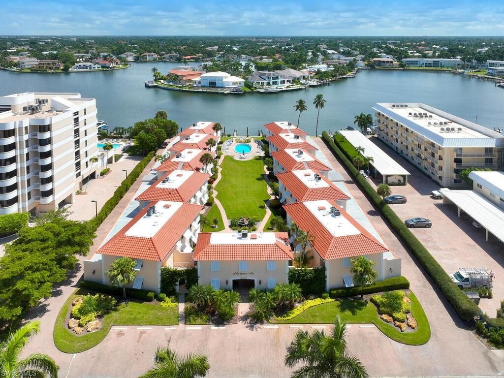 Photo of 3070 Gulf Shore BLVD N #209, NAPLES, FL 34103 (MLS # 226015229)
