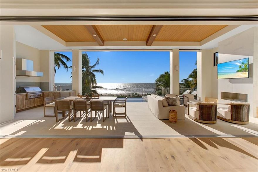 Direct Beachfront, State-of-the-Art, Under Construction residence Expected Completion Fall 2020. A coastal contemporary, modern masterpiece with open floor plan featuring fully pocketing sliders leading to the elevated entertainment deck with infinity pool/spa, outdoor kitchen & fireplace, all overlooking the Gulf of Mexico. Chef’s kitchen features Thermador appliances, stone counters and custom wet bar, perfect for entertaining. Smart-Home technology includes surround sound, automated lighting system, motorized shutters/screens & private elevator. Furnished & professionally designed by area favorite Freestyle Interiors. This spacious custom
home features over 5,500 sq ft of living space with dual master suites, bonus beachfront "cloud room" & 4+ car garage with bonus space for water toys. Built to the newest & most stringent codes by award-winning Potter Homes with concrete block construction & all impact-rated doors/windows. Located minutes to Mercato & North Naples’ amenities, easy access to I75 & the International Airport. This Gulf-front residence encompasses the best of the best; all overlooking the stunning Gulf of Mexico with the sugar sand beach as your backyard.