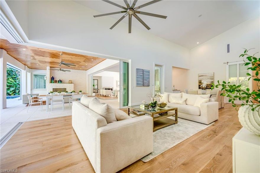 This stunning 4 bedroom, new construction home is just steps to the white sand beach and the Gulf. Located on quiet North Lake Drive, the pinnacle of Old Naples locations, this architectural masterpiece designed by Jon Kukk is open and light filled. Pictures and words can not describe the feel of this highly sought after combination of indoor/ outdoor living and location. The comfort of this home is unmatched in Old Naples. The designer selected finishes include Legno Bastone flooring, Sub Zero/Wolf appliances, Andersen windows, Porcelonosa tile,
quartz and natural stone countertops, and custom cabinetry and millwork. If you desire to enjoy Naples as generations before you have, this is the home that combines past simplicity with today's modern conveniences and luxury.