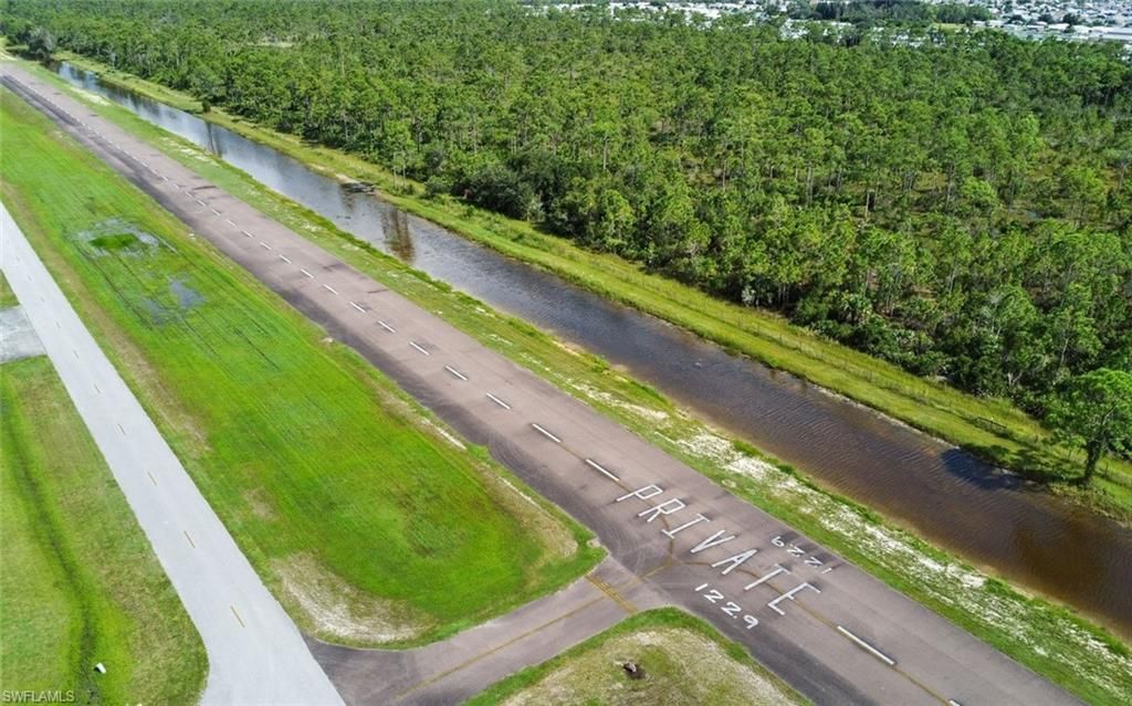 Photo of 18683 Baseleg AVE, NORTH FORT MYERS, FL 33917 (MLS # 226005763)