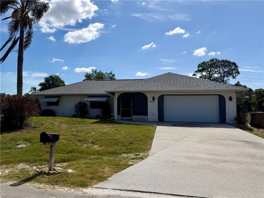 Move-In Ready Home on a Spacious Corner Lot with Major Updates! Welcome to this well-maintained 3-bedroom, 2-bath home situated on a large corner lot offering plenty of space and privacy. This property has been thoughtfully updated with a new roof, newly remodeled kitchen, and a newer A/C system, providing peace of mind and comfort for years to come. Step inside to discover a bright and open living area with updated flooring and a modern kitchen featuring stylish cabinetry, ample counter space, and a functional layout perfect for everyday living and entertaining. Both bathrooms are clean and well-appointed, and the home is truly move-in ready. Enjoy the Florida lifestyle year-round in the sun-filled Florida room at the back of the home an ideal space for relaxing, hosting guests, or creating a home office, hobby area, or additional living space. The oversized corner lot offers room to spread out, garden, or simply enjoy the extra outdoor space. Conveniently located near shopping, dining, schools, and major roadways, this home combines comfort, updates, and location in Lehigh Acres.