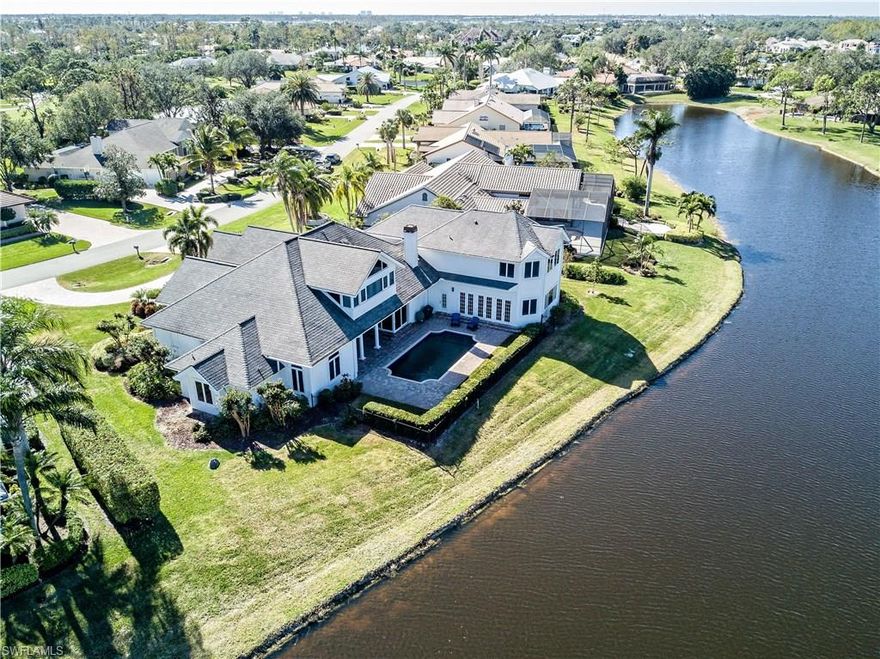 You will love this Grand Custom Pool Home on an oversized lot. Volume ceilings, crown molding, pillars, Lutron Lighting, real wood plantation shutters, custom built-ins, hurricane rated windows, solid wood doors plus an open floorplan highlight the panoramic views. WOW, four BDRMS (all w/ En Suites) + den & Bonus Rm, five full baths & one-half bath (w/custom vanities & exquisite finishes).Formal living & dining open up to the main family room w/ wood burning fireplace-The kitchen has top of the line built in appliances:Thermador Fridge(overlay),Prof. gas DCS Cooktop, 2-Dishwashers(1-new),Butler’s Pantry, large center-island(prep sink). Large wet bar, custom built-in cabinetry, wine cooler, mini frig. Flowing natural stone tile & wood flooring (main living areas).Bonus room w/French doors lead to the open pool area! First-floor master suite w/ En suite, beautiful custom marble tile work, large soaking tub, Huge glass enclosed shower & his and hers closets. Dual staircase takes you to second-floor bedroom areas-perfect for guests (three En-suites), of all with panoramic views.Extra features:2 new water heaters, Attic-blown in foam insulation, NEW-3 A/c’s, 2 Laundry Rooms. A Must See!