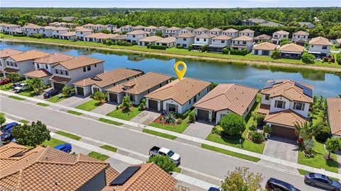 Photo of 8932 Madrid CIR, NAPLES, FL 34104 (MLS # 226028244)