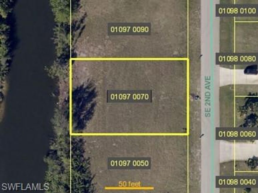 LOCATION: This lot is located in the heart of SE Cape Coral on the big chain of lakes.  UTILITIES: City water and sewer are available, and all assessments have been paid, which is a significant cost savings for the potential 
buyer.  WATERFRONT PROPERTY: The lot is situated along the Washington canal, offering beautiful western exposure. It provides access to miles of freshwater canals and ten lakes, including Shamrock Lake, Saratoga Lake, Lake Kennedy, Alhambra Lake, and Weatherly Lake.  RECREATION ACTIVITIES: This location is perfect for water enthusiasts. You can enjoy various water sports such as boating, water skiing, jet skiing, stand-up paddleboarding, kayaking, and fishing. You have the convenience of freshwater canals and quick access to salt/gulf water through nearby boat launches.  CONVENIENT ACTIVITIES: The property is situated near the Pine Island and Veterans Parkway corridors, making it easy to access dining, shopping, banking, and more. Additionally, it's close to schools, a BMX park, a skate park, Sunsplash, and several golf courses. BEACH ACCESS: For those who love the beach, Fort Myers Beach is just a 30-minute drive away.  An amazing lifestyle awaits you here!