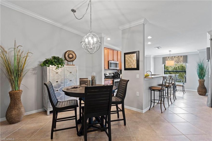 SEASON IS HERE and this is your chance to own a beautifully upgraded condo with a TRIPLE VIEW right in the heart of Bonita Springs! This home is the highly sought after "Diangelo" floor plan with 2 beds, 2 bath, a spacious den, two screened in lanais and 1 car detached garage. Inside is tastefully appointed with granite countertops, crown molding, stainless steel appliances, large porcelain tile on the diagonal and cozy carpets in the bedrooms. Uniquely added finishes include upgraded lighting and fans in the main areas, upgraded paint schemes throughout and ceiling fans on both lanais! This home offers one of Bonita National's many breathtaking views from the lanai featuring the long lake, the golf course and the beautiful preserve! Enticing, wouldn't you agree? All you need to bring with you is a toothbrush and a smile because this condo is TURNKEY!!! Ready to move in AND includes the golf membership which means you have the luxury of enjoying the 18 hole championship golf course in addition to the amenity center which includes a resort style pool, fitness & aerobics rooms, a full spa, pool cafe & bar, 8 tennis courts & more! WHY WAIT?!! Secure this unit while you still can!