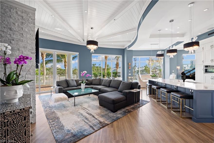 Very rare opportunity to own the amenity floor, end-unit in the newest building at Aqua that boasts the most desirable features of a single-family home while you enjoy all of the luxurious amenities that this boutique high-rise has to offer!

This 4-bedroom + Den, 4.5-bath residence provides 4,483 sq. ft. of living area while providing an effortless transition from the interior of the home to your own private gated backyard just steps away from the pool, spa and marina with your own 40’ boat slip with direct access to the Gulf of Mexico. Take a short ride on your private elevator that leads to your own two-car garage! 

Major upgrades completed including two brand new Water Heaters, Sub-Zero and Miele appliances, custom Cristallo backlit wall, Edgar Berebi custom cabinet pulls, SONOS audio system, Schonbek and CYAN lighting, Lutron custom lighting controls, LED wall fireplace, remote sun shades, robust WIFI and network system with electronics rack, Weber BBQ and much more!

Amenities include 24-hour concierge service, advanced golf simulator, fitness center, outdoor putting green, dog run, private theater, billiards, library, guest suites, Sky Lounge & Terrace and more.