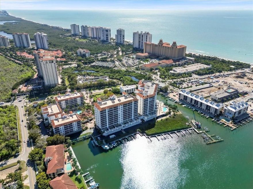 This spacious end unit has been renovated and furnished to perfection, featuring high-end finishes and beautiful furniture that complement the incredible bay views from your large lanai. With a separate living floor plan, the primary suite offers built-out closets, a gorgeous shower, large soaking tub, dual vanity, and stunning bay views, all with nice separation from family and guests. This residence, filled with natural light, includes 3 full bedrooms plus a den or flex space off the kitchen, along with 2 full baths and a powder bath. As an end unit, it is filled with natural light from additional windows throughout, including guest suites that enjoy open views rather than facing interior hallways. Located in a gated community, security is top of mind from the moment you enter through the gate and arrive at your secured door. Residents enjoy a pool along the bay, an additional resort-style pool, and a fitness center. Step outside your private retreat and walk past the new Ritz Residences of Naples on your way to beautiful Vanderbilt Beach. Head over to the Pavilion for a movie theater, ice cream shop, Brooks Burgers, Skillets, Tacos and Tequila, LA Fitness, and more. For even more dining and shopping just steps away, Mercato offers Whole Foods, Nordstrom Rack, CycleBar, Yoga Lab, and a wide range of restaurants. Enjoy sunsets at Gumbo Limbo on the beach at the Ritz, and experience some of the best nightlife in Naples just down the street. Everything you need is right here!