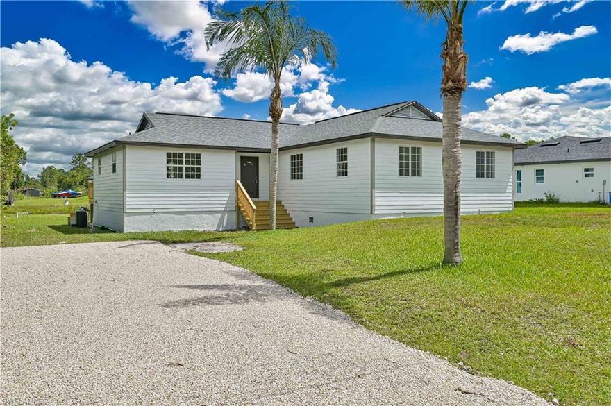 Welcome to this Stunning renovated home In Lehigh Acres back to a canal perfect for fishing. Large renovated 4-bedroom home with an affordable price tag is rare to come up in Lehigh acres. The property has been totally renovated from top to bottom like a new home. Step inside, you'll be greeted by stunning wood plank luxury vinyl that graces the entire house with 5 inches base board gives it the modern feel. The Living room, open concept with kitchen and dining room offers great practical space for family and friends gathering and partying. This luxury kitchen carries brand new hardwood cabinets with soft closing features, beautiful quartz countertop, Huge peninsula and brand-new stainless-steel appliances. Stunning main bedroom with large sitting area. Home has brand-new LED lighting throughout the entire house. Property is in X zone, so no flood insurance is required. Perfect new deck in the backyard oversees practical backyard and canal provides endless Florida outdoor living lifestyle. Hurry up before it is gone.