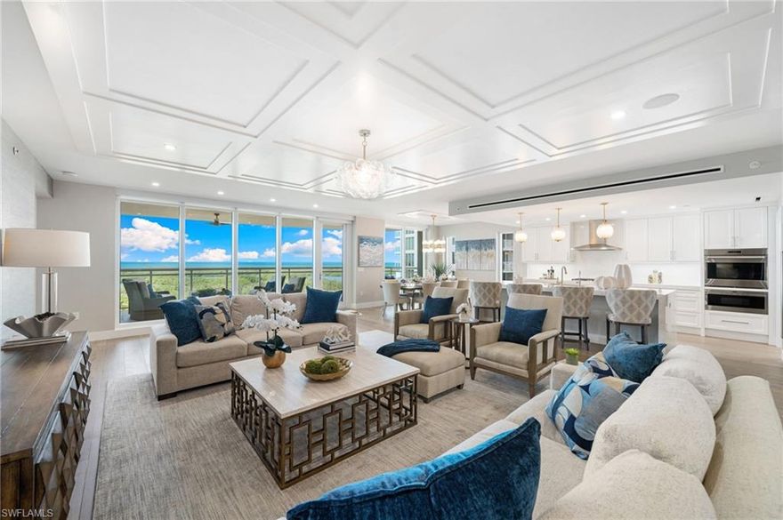 Embrace turnkey luxury at Kalea Bay, the pinnacle of uncomplicated coastal living in Naples. This fully furnished end unit, bathed in natural light through additional windows, features four bedrooms and breathtaking gulf views. In this waterfront enclave, enjoy 24-hour security and unmatched sunset vistas. The residence showcases a chef's kitchen with Wolf and Sub-Zero appliances and a primary suite that captures the essence of gulf living with a spa-like primary bath and spacious walk-in closet. Exclusive access to the rooftop pool and open-air gym elevates leisure time, alongside amenities like Har-Tru tennis courts and a 100,000-square-foot amenity center with additional pools and dining options. This is coastal living redefined pure, simple and wrapped in luxury, where every detail is designed to enrich your life in a community celebrated for its simplicity and elegance.