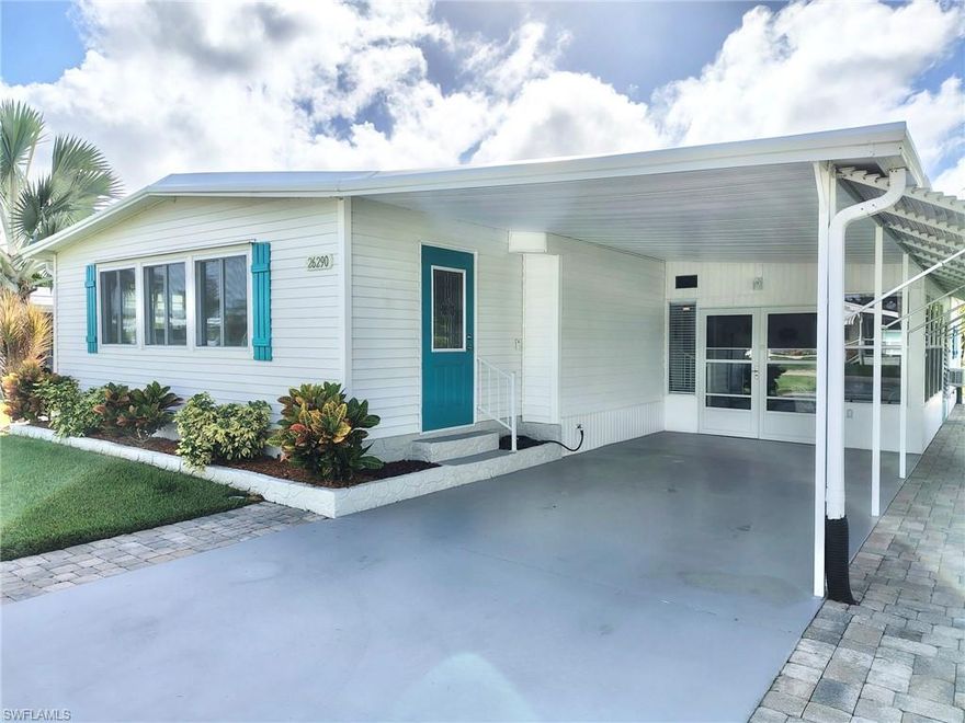 Step inside this pristine 2-bedroom, 2-bathroom home nestled in the highly desirable Imperial Harbor 55+ community, where thoughtful updates and inviting spaces create the perfect setting for comfortable Florida living. The open floor plan seamlessly connects the living room, dining room, and kitchen, offering both functionality and charm. The kitchen is a true centerpiece, featuring white quartz countertops, a glass backsplash, and stainless steel appliances and an oversized sink for convenience.  A breakfast bar provides a welcoming space for casual meals, while updated lighting enhances the bright, welcoming atmosphere. The Florida room is filled with natural light from large windows with roll-down blinds and has its own separate outdoor entrance through a door with an inset stained-glass panel. A passageway window bordered with crown molding connects the Florida room to the kitchen, while crown molding also frames the entryway between the living room and the Florida room, adding an elegant touch to the interior. The master suite showcases marble-style vinyl flooring, a custom light wood plank accent wall, walk-in closet, and a private bathroom with a Silestone vanity and glass door with walk-in shower. The guest bedroom also offers a walk-in closet, while the guest bathroom features a light wood plank wall, Corian vanity, wainscoting, and a walk-in shower. The utility room—accessed through a barn door from the screened lanai—includes a washer, dryer, utility tub, and an additional refrigerator for extra storage. The screened lanai features glass windows and two separate entrances from outside: one on the side of the house and a set of double doors from the carport, offering flexible access and a smooth indoor-outdoor flow. Outside, this home continues to impress with a driveway widened by interlocking pavers that border it, a carport, and a side walkway under a Bimini awning leading to a back porch and grill area with a ramp that leads to the shed. The exterior is enhanced by manicured, plush green grass and plants that border the home, all maintained by a sprinkler system on a timer connected to a well. This home has been carefully maintained and includes major updates such as a roof installed in 2017, A/C in 2011, water heater in 2019, and windows in 2016, reflecting its excellent condition and long-term care. Additionally, the property includes a 4-seater electric golf cart and Harbor Club membership, granting access to the clubhouse, heated pool, fitness center, library, billiards, shuffleboard, and bocce courts. This home beautifully blends style, comfort, and functionality with quality finishes and thoughtful updates, creating a move-in ready space that welcomes you from the moment you walk through the door.