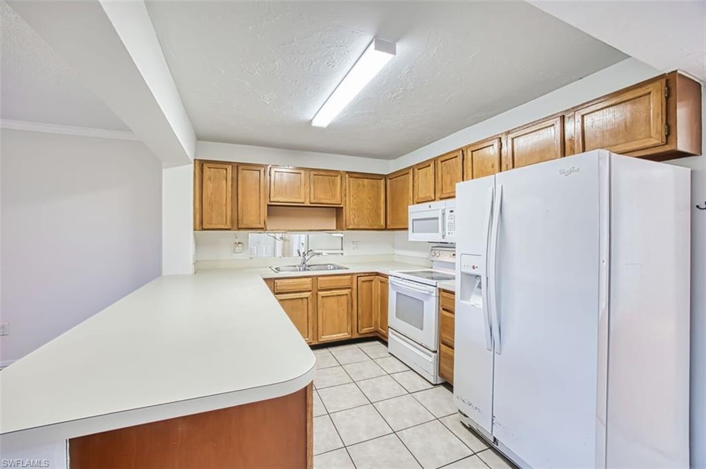 MYERLEE GARDENS CONDO - Residential