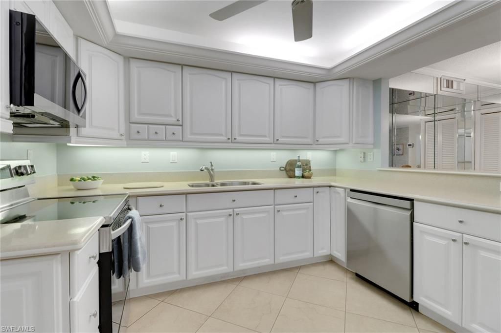 Photo of 3399 Gulf Shore BLVD N #303, NAPLES, FL 34103 (MLS # 225075165)