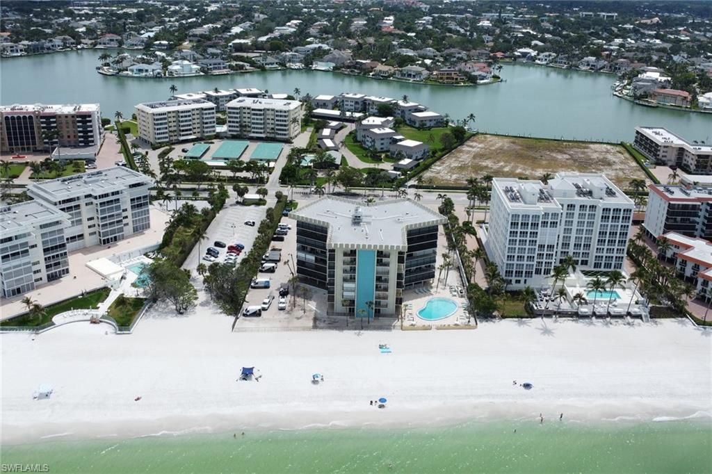 Photo of 3399 Gulf Shore BLVD N #303, NAPLES, FL 34103 (MLS # 225075165)