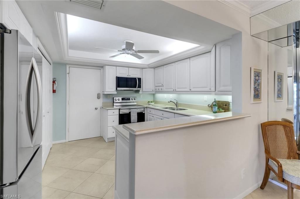 Photo of 3399 Gulf Shore BLVD N #303, NAPLES, FL 34103 (MLS # 225075165)