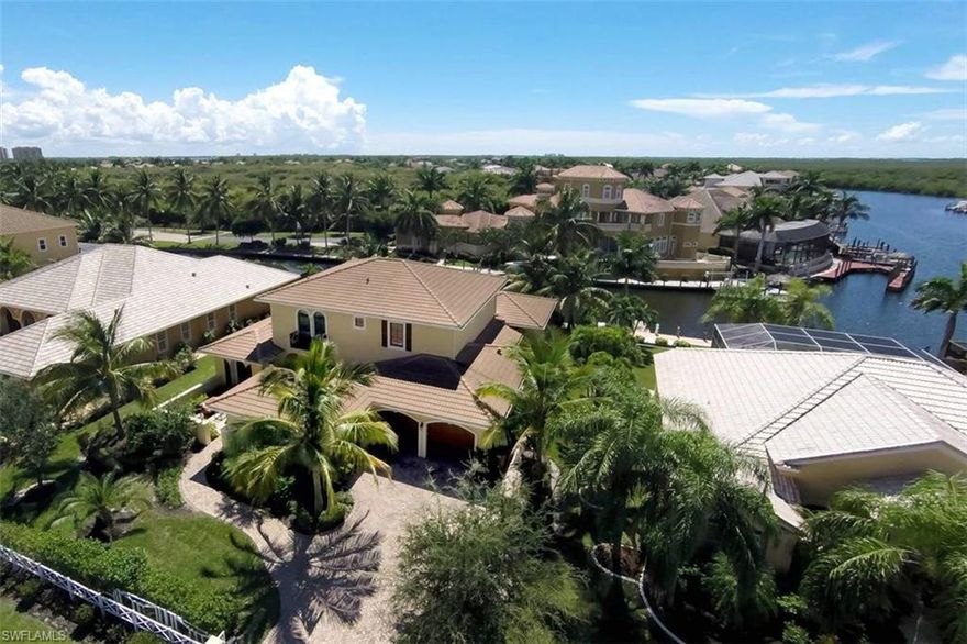 Unique Cape Harbour Residence ! A Custom build, Dream Home in Luxury Mediterranean Style, located in the finest area of Cape Coral, built by Michelangelo Homes, one of the best Home Builders in SW Florida. Southern Exposure, 3 Bedroom + Den/Study, 4 Full Baths and a Powder Room. It all comes high value furnished from Robb and Stucky. Fantastic Features include Custom Wrought Iron Entry Door, Hand Crafted Wood Cabinetry, Granite and Marble Counter tops, Travertine and Hardwood Flooring in Natural Walnut. The awesome hand painted Ceilings in the Master Bedroom and formal Dining as well the tasteful Wallpaper showing harmony and exclusive European Design. A Gourmet Kitchen with raised Breakfast Bar, Stainless Steel Appliances. All Appliances are Energy Saving from BOSCH. Energy Efficiency ICYNENE Insulation in Attic/Roof Trusses, Low E Impact Glass. Amazing Pool Area, Travertine Paver Decking. Disappearing Electrical Screen Enclosure. Outdoor Kitchen with Jenn Air Grill and Exhaust Hood, U-line Refrigerator and Granite Counter Top Tropical Landscaping with Lighting and lavishly Plantings, large Composite Dock with Captains Walk, Boat Lift and two Jet-Ski Lifts plus Tiki Hut.