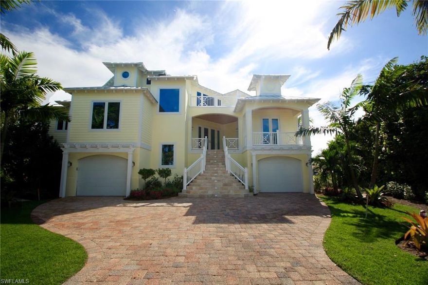 New Construction (November 2015), Corner Canal Lot w/ Long Dock & Boat Lift, Furnished, Elevator, Pool & Patio Surrounded by Canal, Sub-Zero & Wolf Appliances, Gas Cook-Top, Vaulted Ceilings, Bay Views from Every Room, Granite Counters, Recessed Electrical Window Blinds, Electric Roll Down Screens on Lanai, Hardwood Floors, Custom Floating Stairwell, Master Retreat w/ Sitting Area Overlooking Canal, Interior Wood Ceilings, Pecky Cypress Lanai Ceilings, Endless Storage Areas, Whole House Generator, Oversized Walk In Pantry