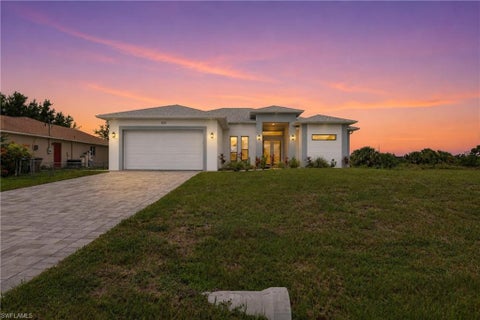 Photo of 1120 NE 32nd LN, CAPE CORAL, FL 33909 (MLS # 226028585)