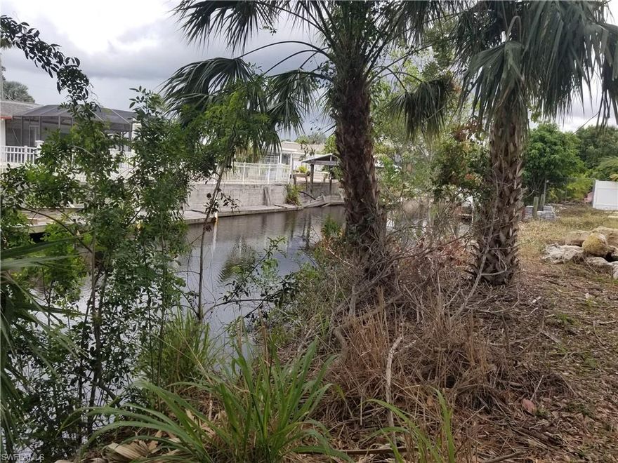 This lot affords you the opportunity to enjoy boating, fishing and beautiful sunsets from your new home.  With western exposure and located on a  navigable canal this property is a great find. Located close to magnificient beaches, restaurants, shopping and River Park. Bring your own builder, or let us provide you with a package deal. Land on the water will be scarce in the near future, so take advantage of this opportunity. No HOA fees allows you to save on monthly expenses. If you are in the market for a waterfront lot this might be the one, come see for yourself you will be glad you did.