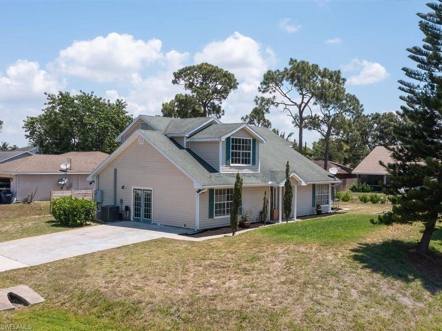 LOCATION and AMPLITUD is this house! As soon as you open the door you feel the amplitude of all the spaces. Living room, dining room, kitchen, bedrooms, laundry ... everything is spacious including lot and parking lot. There is things that you CAN NOT CHANGE: LOCATION and SPACIOUS is one of those. Don't pass up this SPACIOUS home in desirable and centrally located San Carlos Park!! This home features 4 Beds, 2 Baths and 4+ parking space on an oversized corner lot! The Kitchen has an open feel to it with white cabinets, and a large center island! On the second floor is The spacious Master Bedroom with sitting area to have your morning coffee reading a book or your cozy office space! Bathrooms has been remodeled and there is a lot of potential changes up to your imagination that you can do in this 2,312 Sq Ft living area. What about the outdoors space? Yard is fence, over-sized lot enough for privacy, build a pool or just relax having a BBQ in the Spacious back yard! This home is perfect for Entertaining!! San Carlos Park is minutes from SWFL Airport, I-75, Bonita Beaches, Fort Myers Beach, Hertz Arena, Miromar Outlets, Coconut Point Mall and tons of Restaurants!!