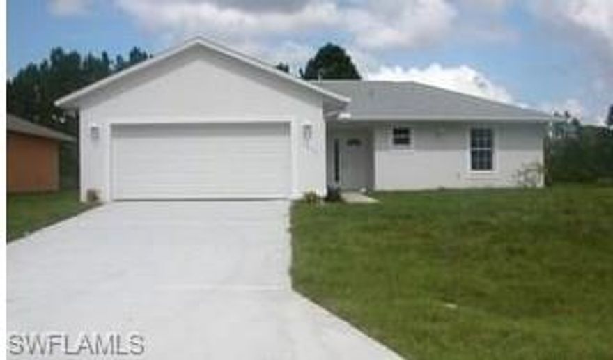 Beautiful, spacious home featuring 3 bedrooms, 2 bathrooms and a 2 car attached garage located in a up and coming area of Lehigh Acres.  This home has a fantastic floor plan with 1347 sq ft under air! Some of the features include tile throughout, great room, breakfast bar and indoor laundry room. The master bedroom includes a large walk in closet and private bathroom with tub and shower separate. This home will not last long schedule your showing today!