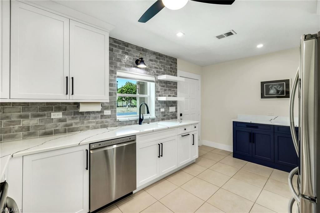 Photo of 26896 Spanish Gardens DR, BONITA SPRINGS, FL 34135 (MLS # 226013621)