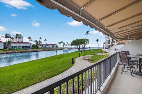 Photo of 2301 Gulf Shore BLVD N #114, NAPLES, FL 34103 (MLS # 225053514)