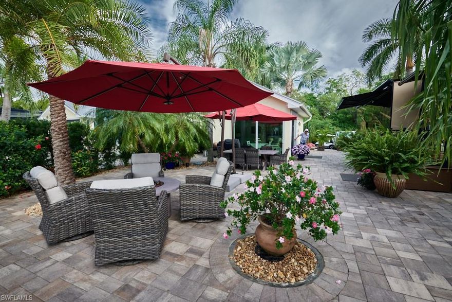 Discover a property that’s almost too good to be true, a spectacular waterfront retreat with loads of shade! Imagine stepping into your own lush, tropical haven. Lot 136 is the ultimate getaway where privacy and charm meet the enchantment of a secluded island escape. Towering palm trees drape gracefully over the property, providing cool shade and a serene ambiance while framing breathtaking views of the tranquil lake and its centerpiece fountain. Whether it’s the gentle touch of sunlight or the soft glow of moonlight, this peaceful scene will captivate you day and night. This is a pride-of-ownership property where care and love shine through in every detail. The lot was refreshed with sealed pavers in August 2024, giving it a pristine, polished look. At the heart of this oasis lies a spacious Coach House, a masterpiece of design and comfort. Step inside to be greeted by stunning glass sliders, soaring ceilings, and a chic loft that adds a touch of rustic elegance. The luxury continues with high-end finishes throughout, including granite countertops, a farmhouse sink, and an eye-catching designer backsplash. The convenience of a bathroom with a washer and dryer completes this perfect space for both relaxation and entertaining. Life at RiverBend Motorcoach Resort is as vibrant as it is relaxing. This golf cart and pet-friendly community is nestled along the scenic Caloosahatchee River, complete with a private boat ramp for your water adventures. Resort-style amenities include a sparkling large pool, a lap pool, hot tubs, and a cabana pool bar providing endless ways to unwind and soak up the Florida sunshine.
For those who love to stay active, the resort offers eight pickleball courts, bocce, shuffleboard, and a putting green, along with an exercise room and seasonal activities to bring the community together. The River Clubhouse, with its stunning river views, and the Pool Clubhouse, with its convenient amenities, are the perfect gathering spots. Enjoy a variety of entertainment options, including billiards, bingo, RC clubs, and hobby trains nestled under the oaks. This vibrant and welcoming community ensures that every day feels like a celebration of the good life. Your Slice of Paradise Awaits! Don’t let this tropical treasure slip away, make Lot 136 yours today.