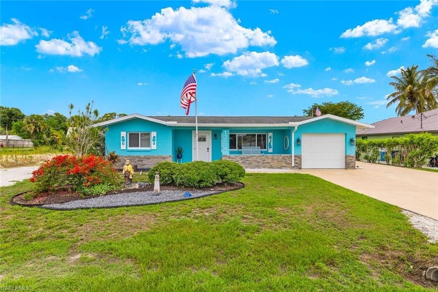 Seller will contribute to buyer’s closing costs on this Gulf-access paradise! Located on a deep-water canal with direct Gulf access and no bridges, this home features an 80’ wood dock with a new seawall (2023) and a 12,000-lb boat lift with new motors, perfect for boating enthusiasts. This beautiful 3-bedroom, 2-bathroom home offers a spacious, open floor plan with tile floors and crown molding throughout the main living areas. The kitchen boasts granite countertops, abundant cabinet and pantry space, and a large formal dining area overlooking the backyard and canal. Recent updates include a new A/C with ducts (2023), upgraded electrical panel, tankless water heater, new gutters, new fence, impact windows, impact garage door, and a new glass door in the master bathroom, as well as fresh interior paint. The laundry room is equipped with a washer, dryer, built-in cabinets, and a utility sink. Enjoy the oversized screened lanai, large backyard with southern exposure perfect for a pool, side parking with RV hookup, and a spacious single-car garage. Natural light fills the home, and the breezes off the Caloosahatchee River make outdoor living a pleasure. Well-maintained and in pristine condition, this home combines comfort, functionality, and a prime waterfront location. Excellent schools nearby include Riverdale High School and River Hall Elementary. With all these features, this home truly has it all – book your showing today before it’s gone!