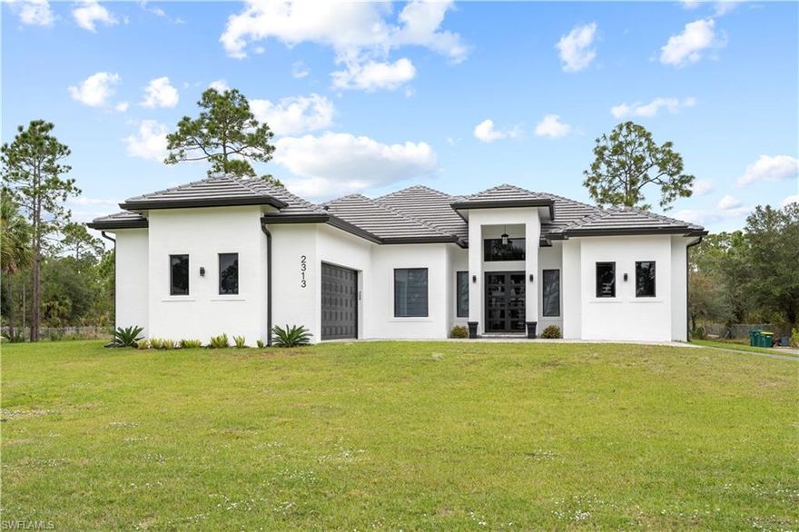 Beautiful property in an excellent location, offering 2,449 sqft of Living Area and 3,434 sqft Total, situated on nearly 3 acres of 100% upland land. This expansive lot provides endless possibilities, including the option to build a large resort-style pool to enjoy with family or even a guest house.

The interior is thoughtfully designed to impress, featuring 4 Bedrooms, 1 Den, and 3 Bull Bathrooms. The home boasts a stunning custom kitchen with custom cabinetry, along with impact windows and doors throughout. Additional highlights include an outdoor kitchen, double driveway, and plenty of space for entertaining and future expansion.

Don’t miss this incredible opportunity to make this exceptional property your dream home.