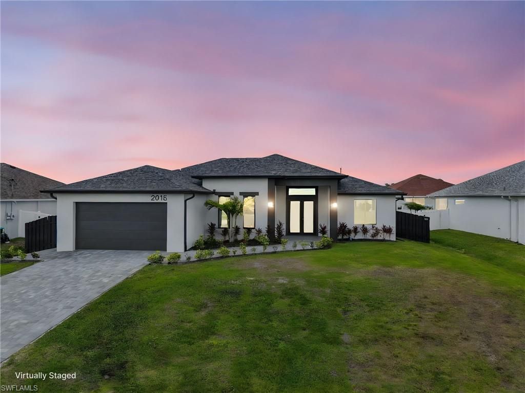 Photo of 2015 NW 21st ST, CAPE CORAL, FL 33993 (MLS # 226013485)